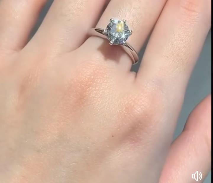 A Crown Ring Moissanite Ring