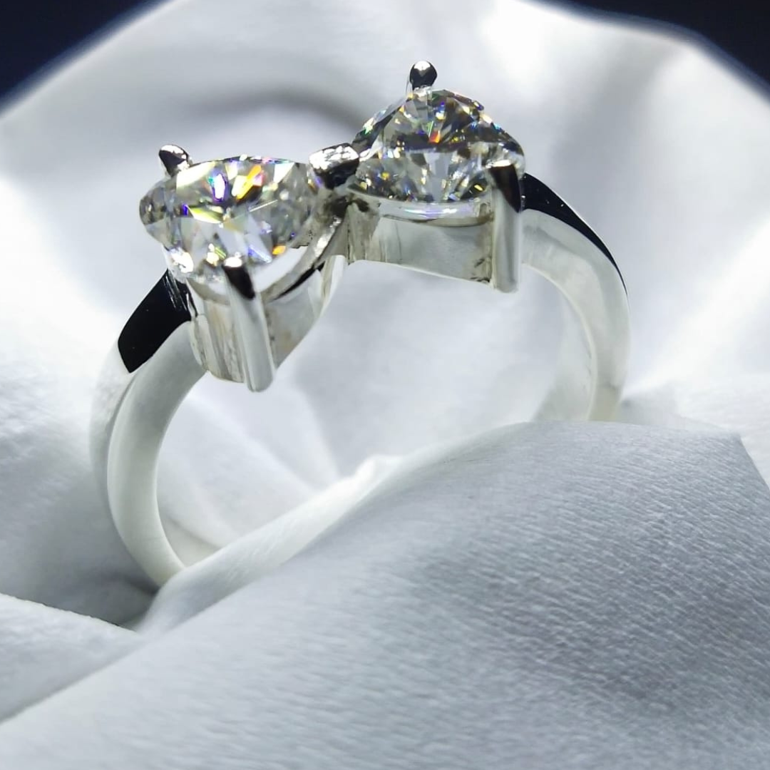 Bow-style Engagement Moissanite Ring