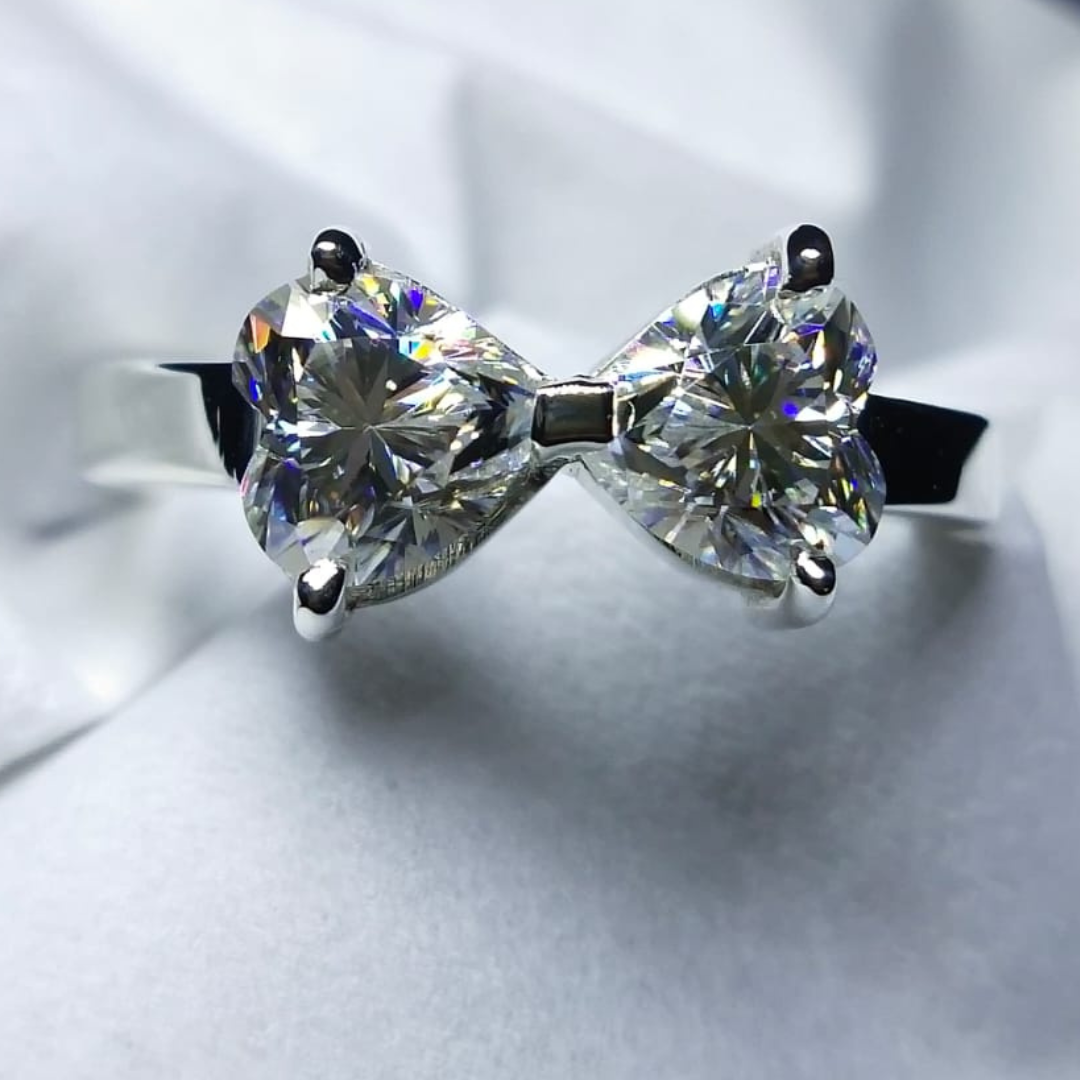 Bow-style Engagement Moissanite Ring