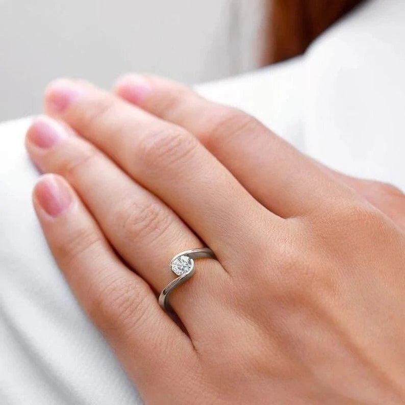 A Solitaire Twisted Moissanite Ring - Nawaz Jewellers